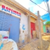 PARCELLE INACHEVÉE DE R+2 AVEC 2 MAISON COMMERCIALE A VENDRE À ZAPE 23 Parcelle à vendre