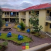 FLAT HÔTEL EN VENTE À KINKOLE PÊCHEUR SUR MACADAM POUR TOUT USAGE COMMERCIAL 22 HÔTEL EN VENTE