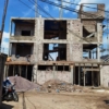 Parcelle en vente Contiennent une maison en étage de trois étages R+3 inachevé à Ngaliema/Okapi 22 Parcelle en vente