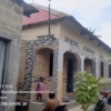 Vente parcelle avec trois portes de locataires au Quartier Terre jaune Commune de Nsele 23 Vente parcelle