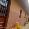 Parcelle 7x20m avec 2 portes locatives en vente à N’sele – Terre Jaune 23 scaled 1005431062